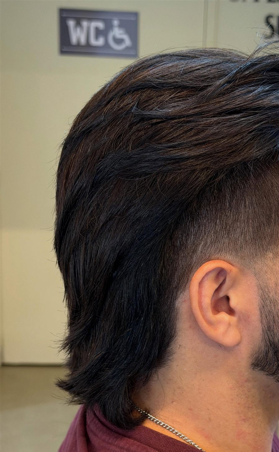 Resultado real: mullet moderno com low fade e acabamento na navalha